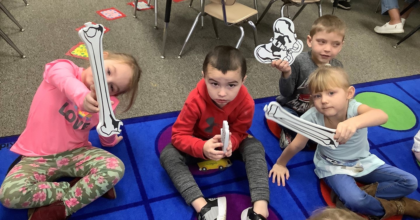 Preschool children with skeleton