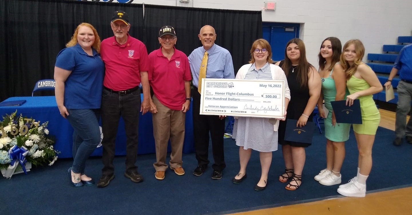 Students present check to Honor Flight Columbus Representatives