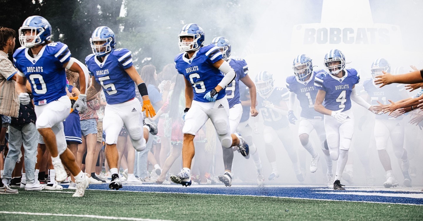 Football running through the tunnel